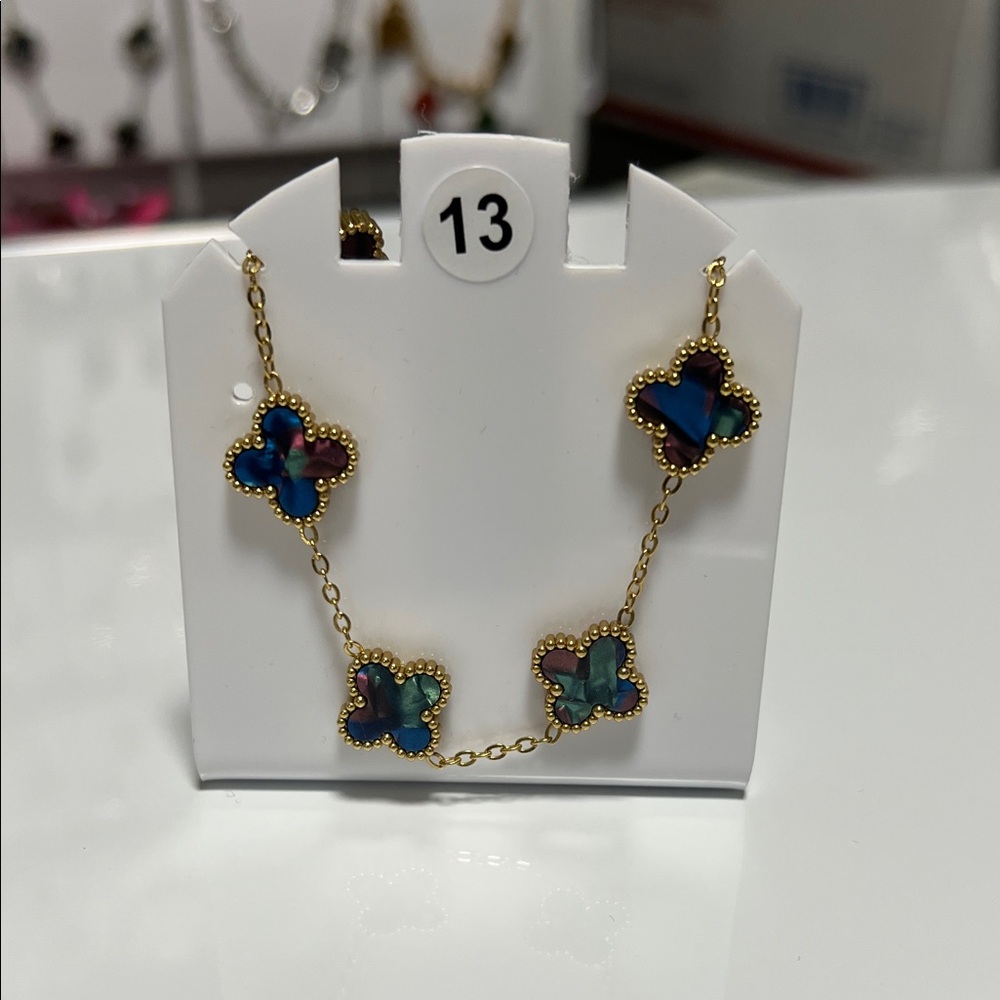 Gold and Blue Clover Charm Bracelet